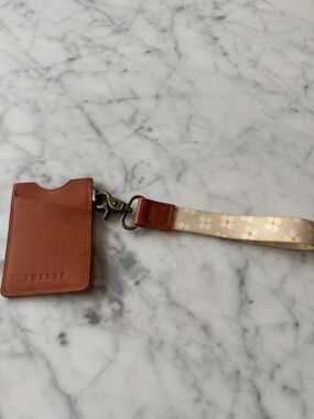 Thread daisy wallet wristlet. 3 pockets.